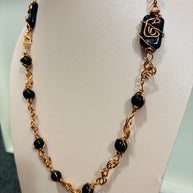 Collana lunga onice nera e rame| Collana boho elegante donna| Gioiello artigianale con pietre nere| Idea regalo donna