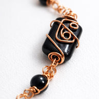 Collana lunga onice nera e rame| Collana boho elegante donna| Gioiello artigianale con pietre nere| Idea regalo donna