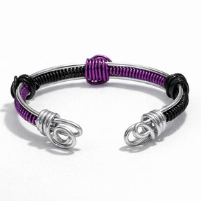 Bracciale rigido unisex regolabile in alluminio antiallergico nero e viola|Bracciale artigianale minimal con spirali|Idea regalo uomo donna