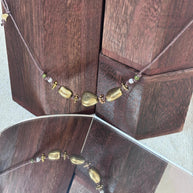 Collana boho con elementi in acciaio dorato | Collana con cordino marrone regolabile | Boho necklace artigianale idea regalo donna