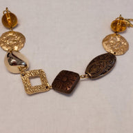 Bracciale boho etnico ambra marrone | Bracciale donna con perline in vetro e elementi dorati | Acciaio antiallergico