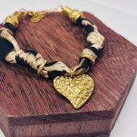 Bracciale animalier con cuore dorato | Bracciale leopardato in tessuto con charm cuore | Gioiello elegante donna in acciaio antiallergico
